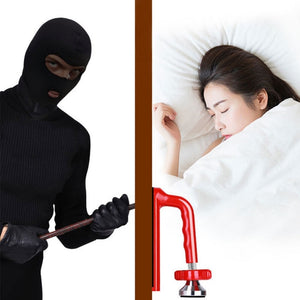 Man in black trying to break into lady's room but unable to because of door jammer