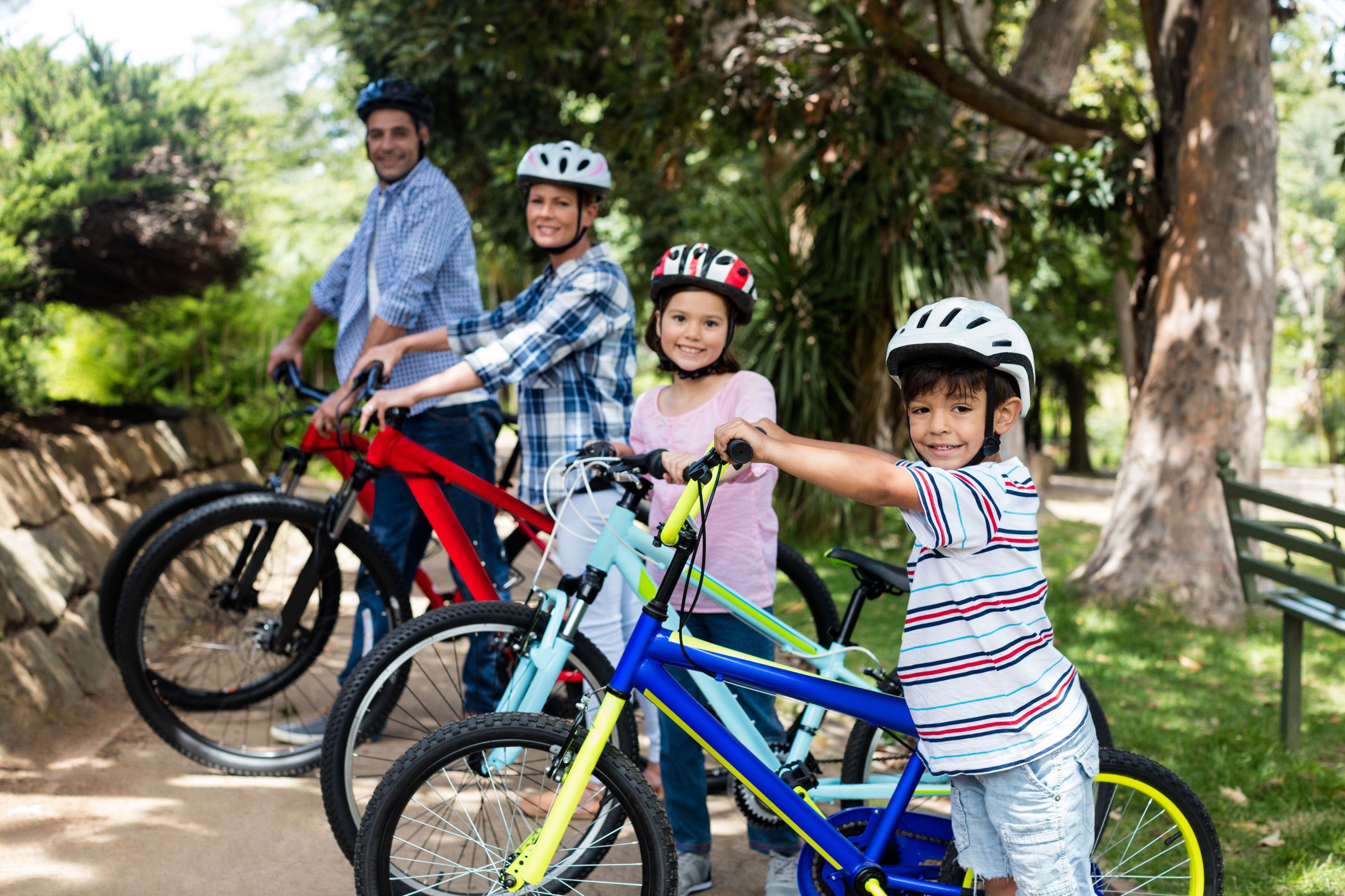 family of 4 bike riding